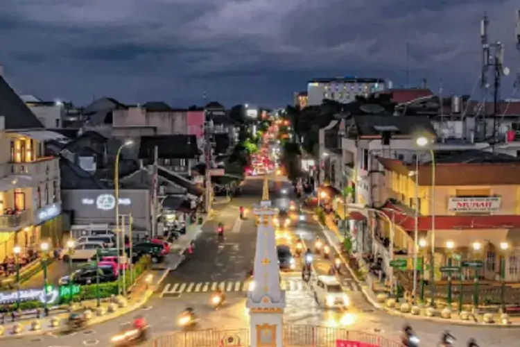 Borobudur Temple, a UNESCO World Heritage site, showcases intricate stone carvings and towering architecture.