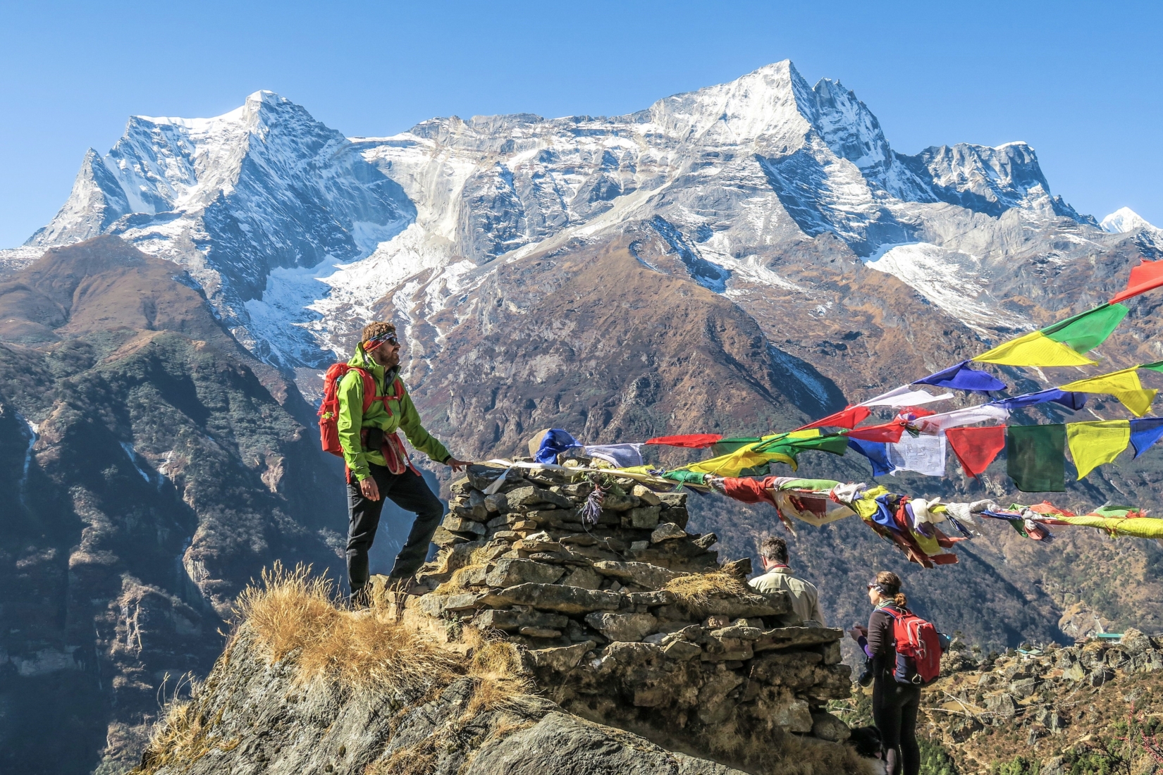 Traditional Sherpa village with prayer flags fluttering in the wind.