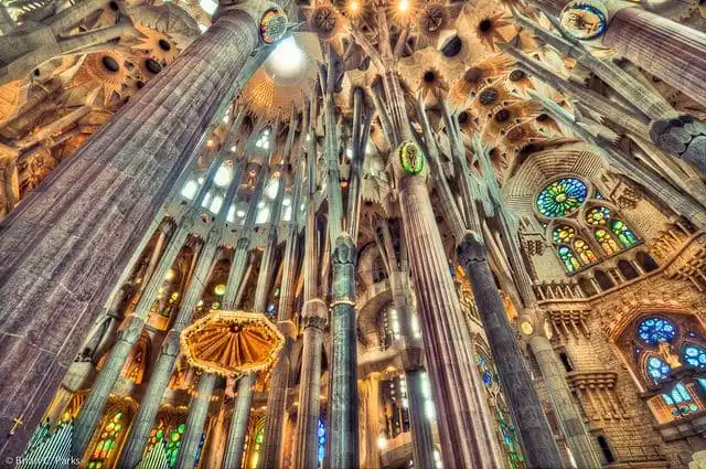 Interior view of Sagrada Família showing the nave and columns. 