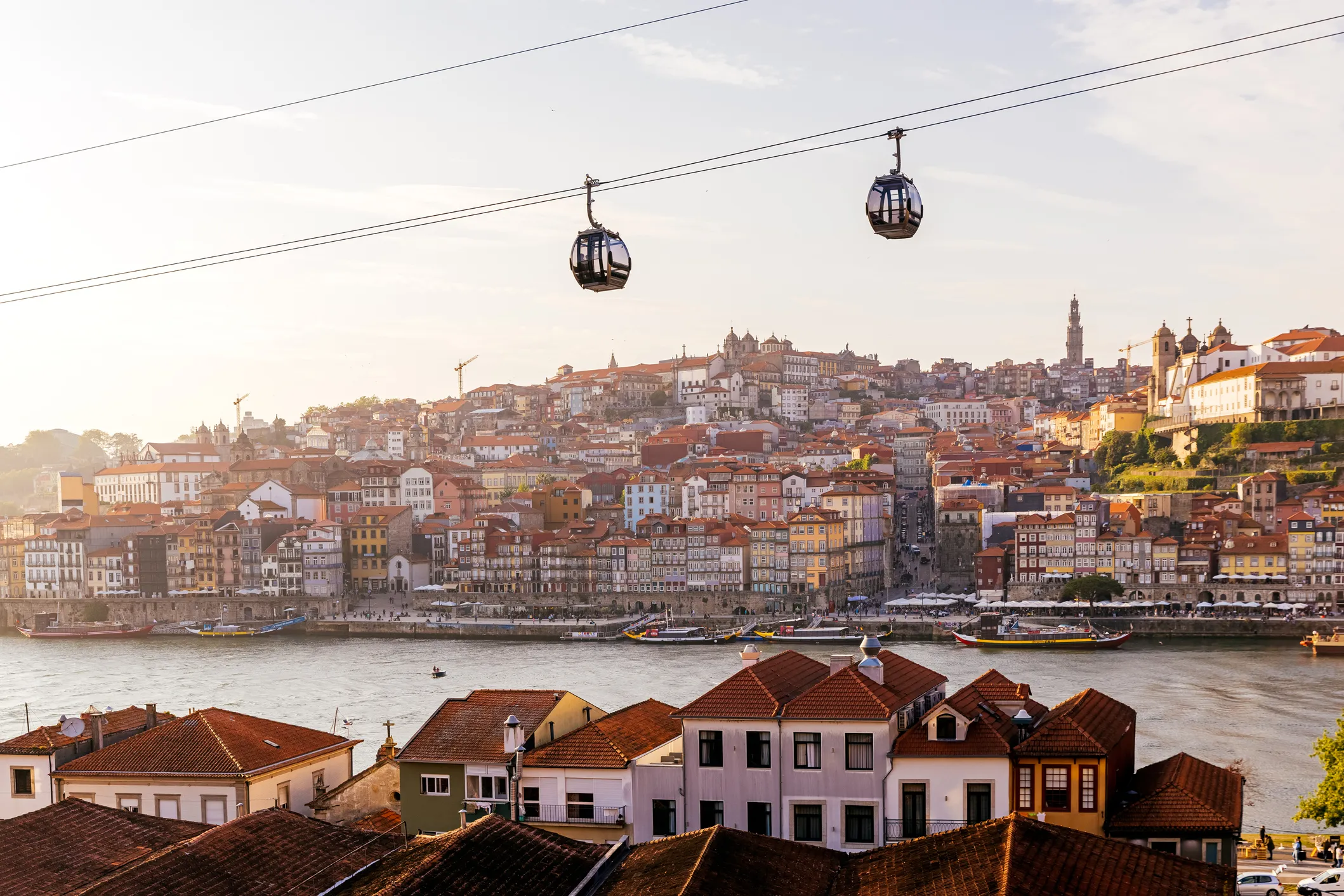 Colorful houses and cobblestone streets in Porto's Ribeira district.