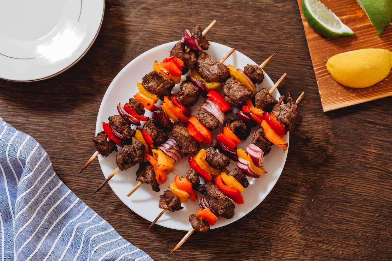 Traditional Middle Eastern kebabs served with fresh herbs 